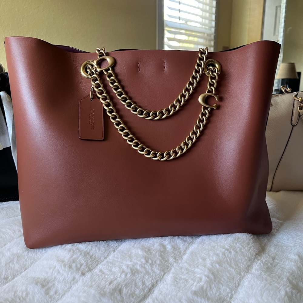 Coach central chain tote was use one time